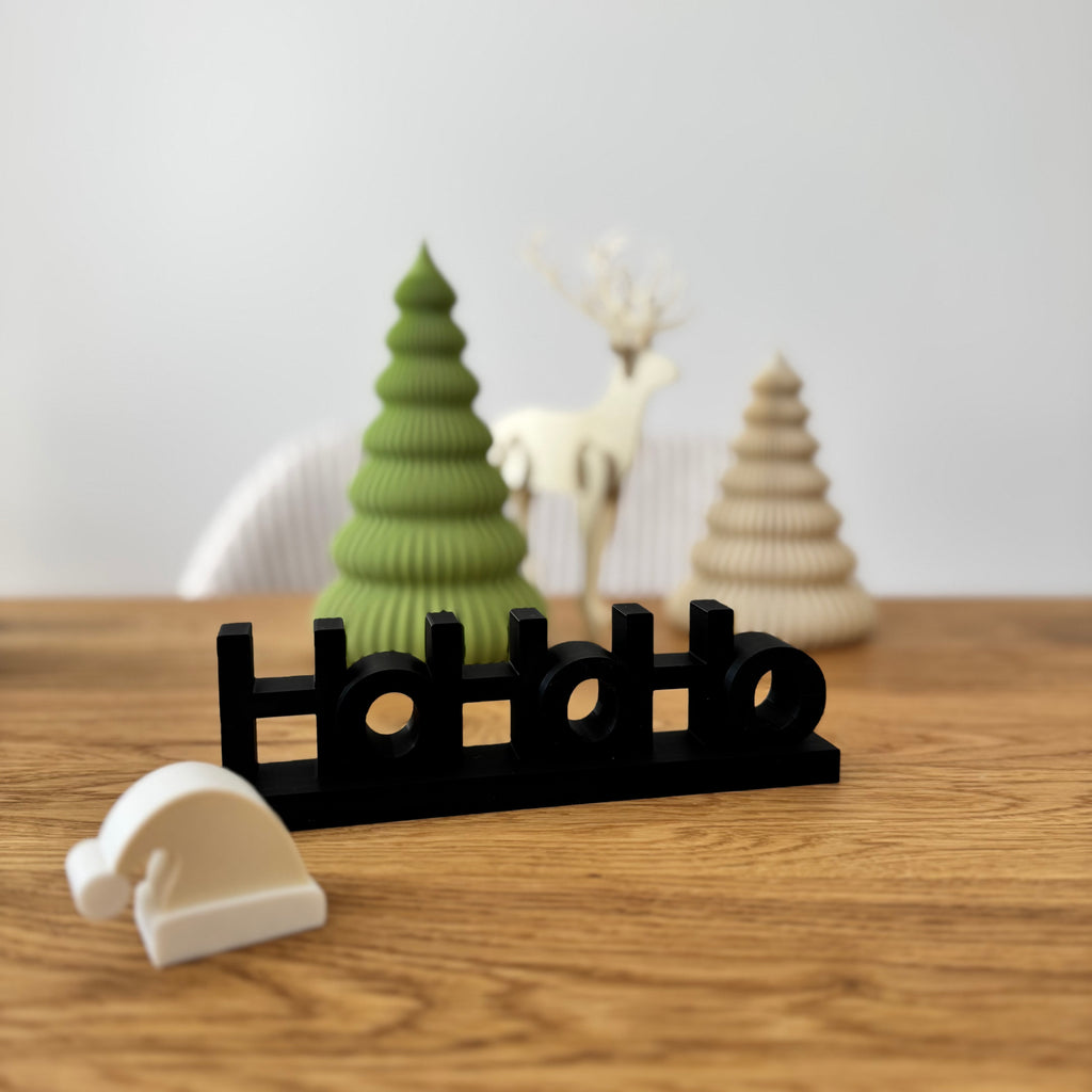 Schriftzug Ho Ho Ho mit Mütze