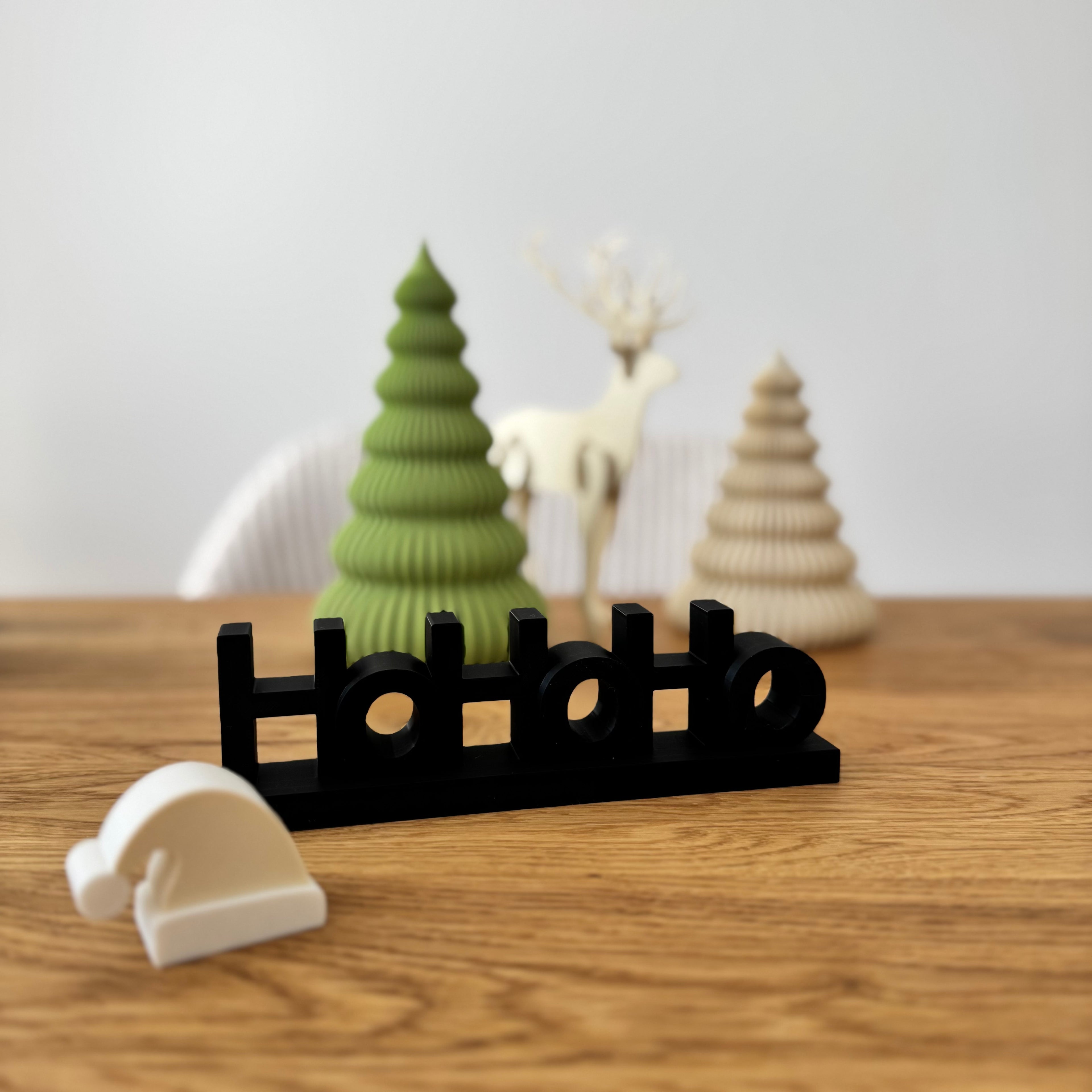 Schriftzug Ho Ho Ho mit Mütze