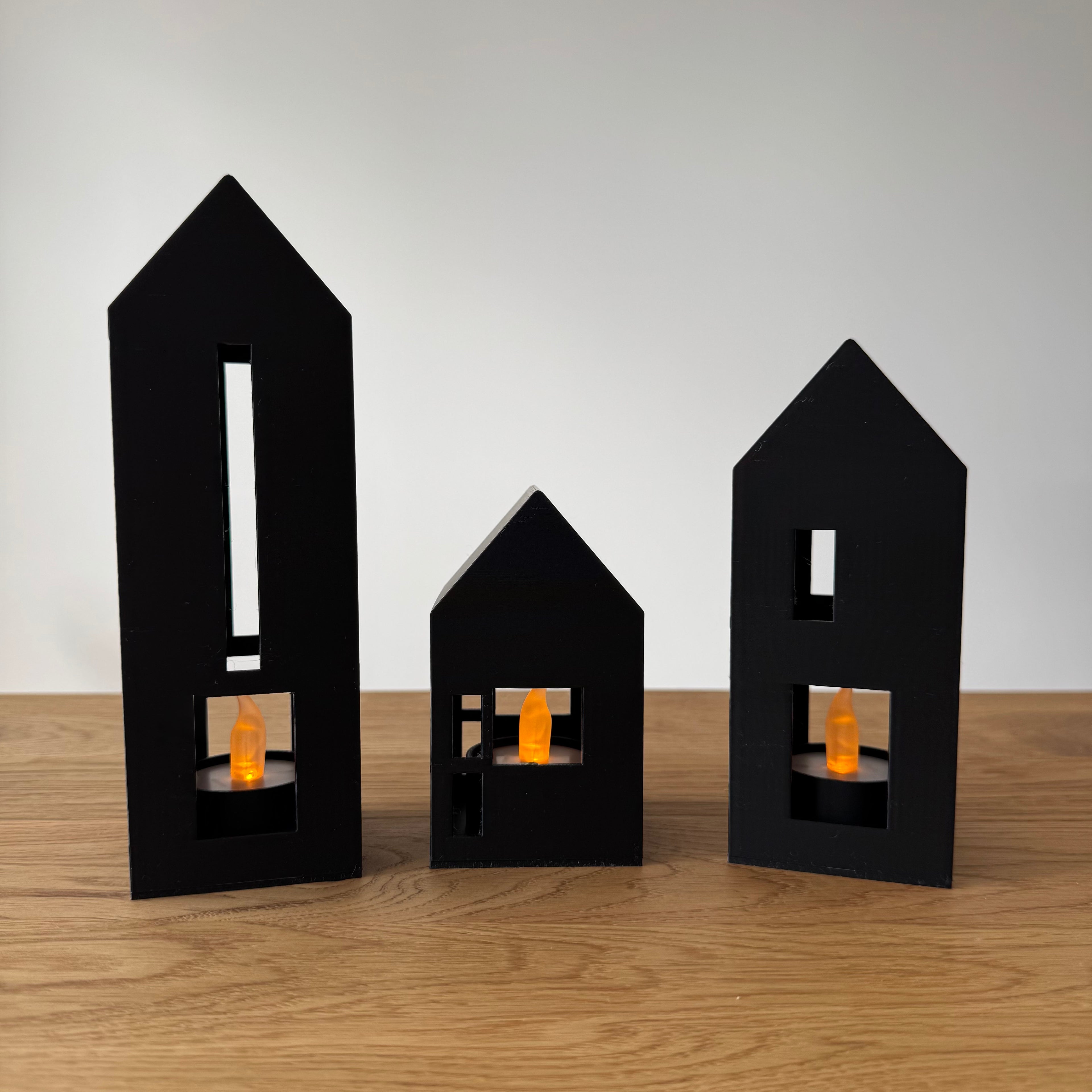 Minimalistische Teelichthäuser